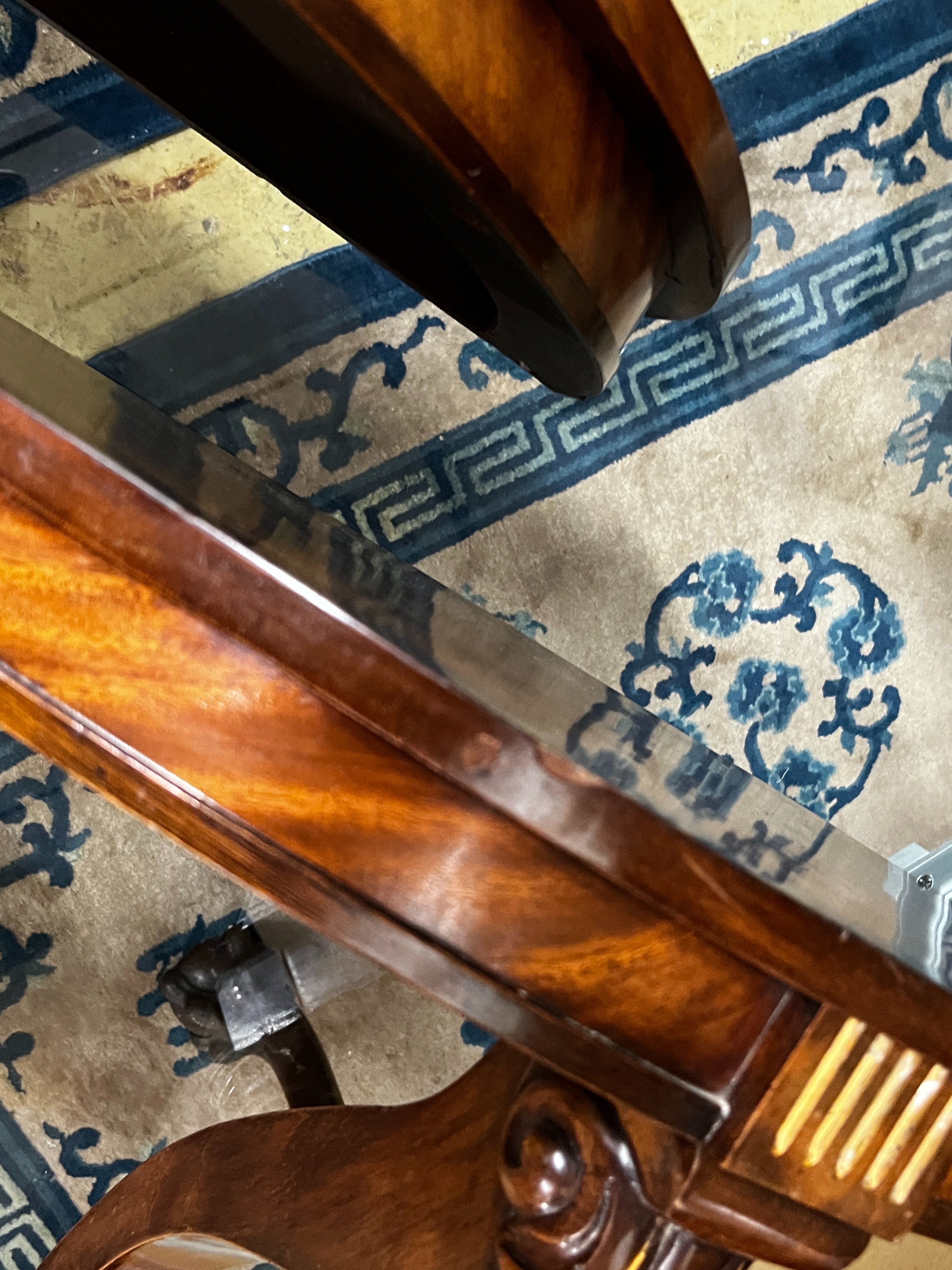 A pair of reproduction parcel gilt demi lune console tables, width 82cm, depth 34cm, height 48cm